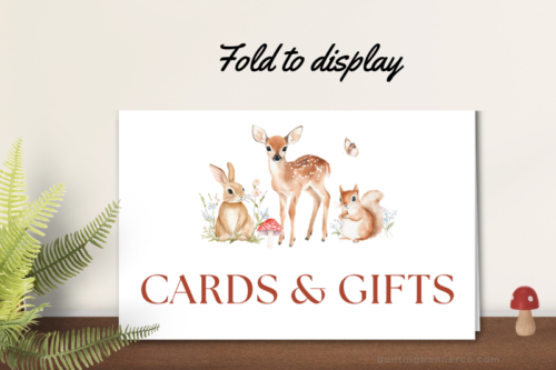 Folded woodland baby shower cards and gifts sign.