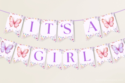 Hanging It's A Girl butterfly baby shower banner with butterflies and wildflowers.