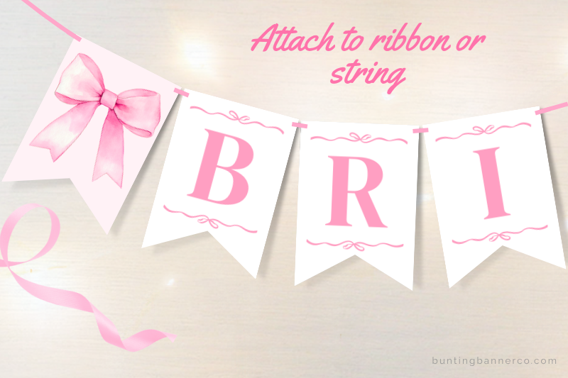 Bridal shower bunting flags with watercolor pink bow and pink letters.