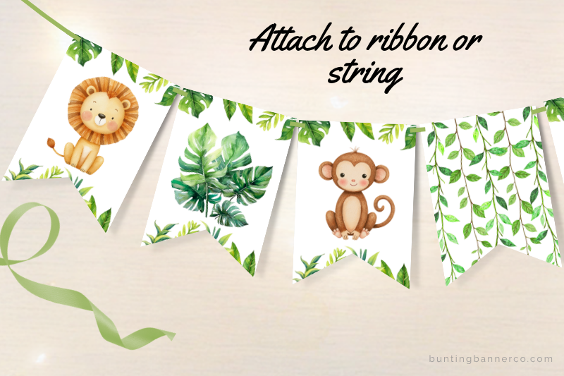 Safari bunting flags with lion, monkey, and green jungle leaves.