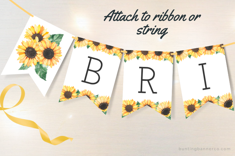 Bridal shower bunting flags with watercolor sunflowers and black letters.