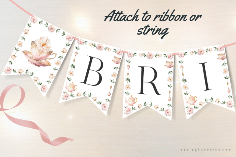 Bridal shower bunting flags with teacups, flowers and black letters.