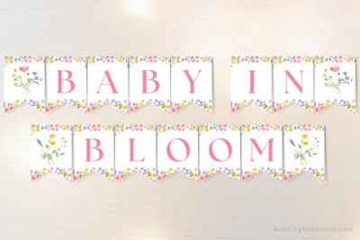 Baby in Bloom wildflower themed baby shower banner with watercolor wildflowers and foliage.