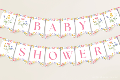 Hanging wildflower baby shower banner with watercolor wildflowers and foliage.