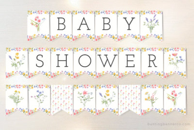 Wildflower themed baby shower banner flags with watercolor wildflowers, bouquets and black serif font letters.