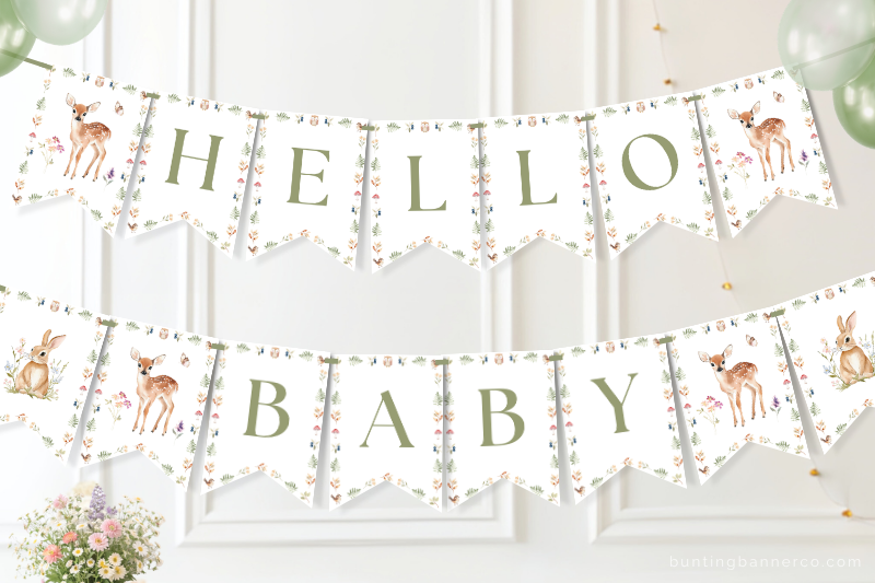 Hello baby Woodland baby shower banner on a wall with watercolor deer and rabbits.