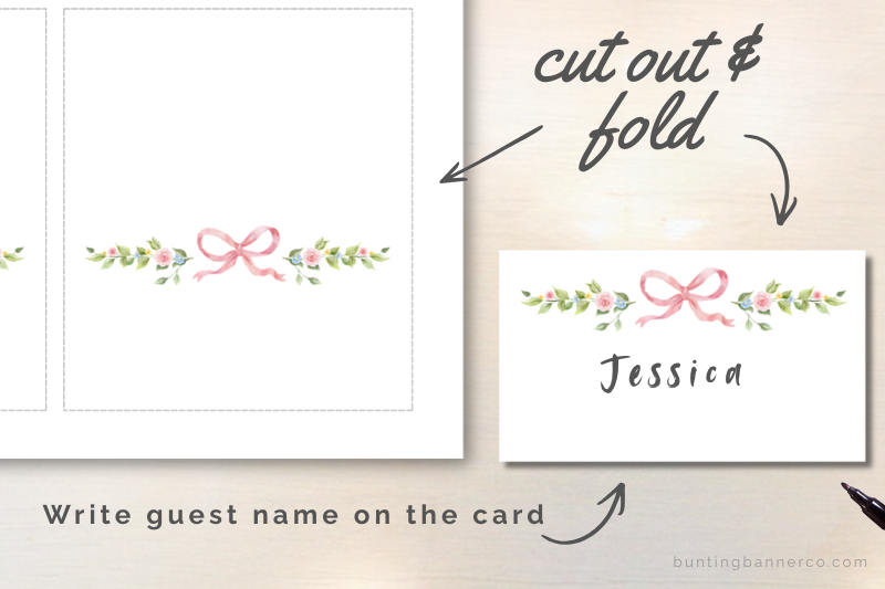 Cut and fold ballerina theme baby shower place cards with bows and flowers.